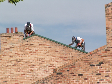 People working on a roof in Argyle Square