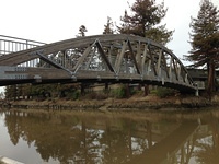 The wooden river-crossing pedestrian bridge in downtown Petaluma
