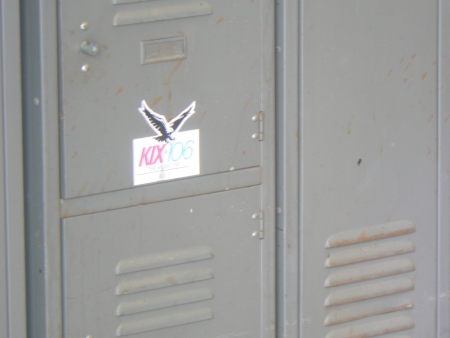 Old Kix 106 sticker on a locker at the Canberra Railway Station