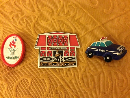 Fridge magnets: Atlanta 1996 Olympics; Grand Ole Opry; NYPD car